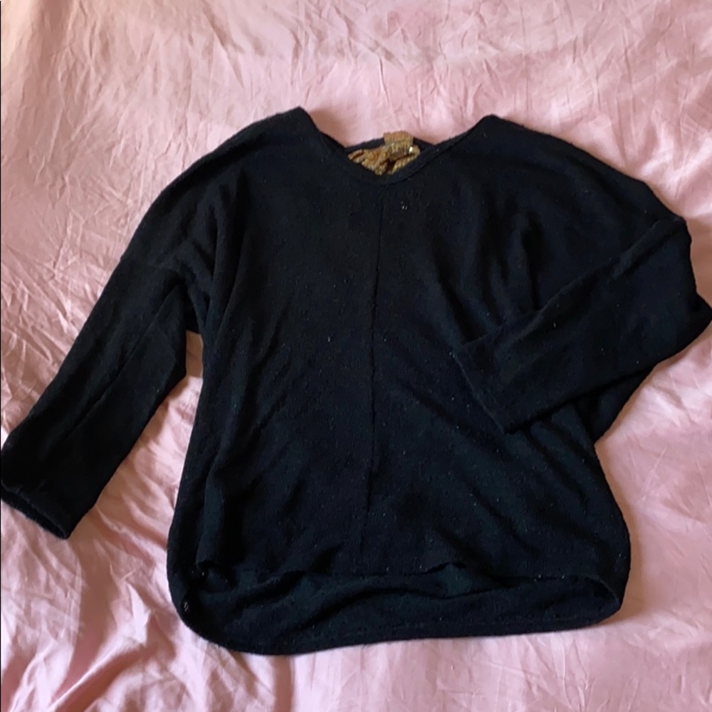 Black sweater with bow